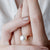Rose Gold Pearl Ring on hand 1